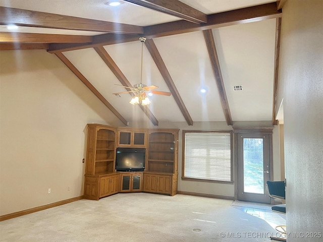 unfurnished living room with a ceiling fan, baseboards, high vaulted ceiling, light carpet, and beamed ceiling