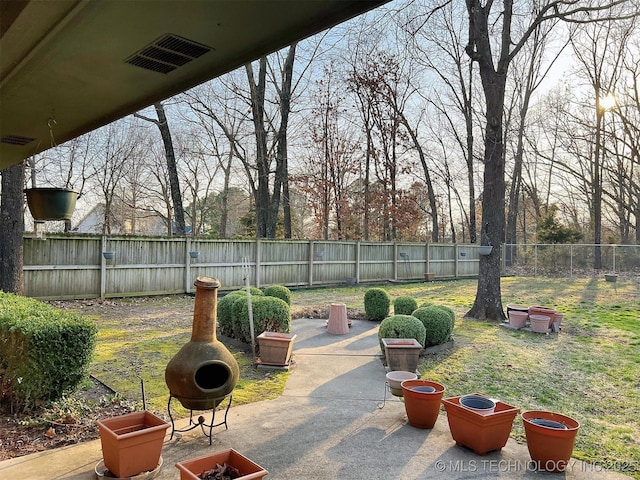 view of patio / terrace featuring visible vents and a fenced backyard