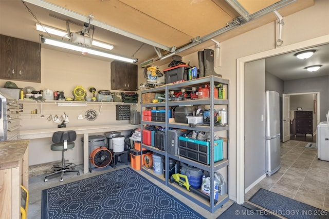 garage featuring freestanding refrigerator