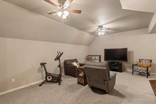 interior space with visible vents, ceiling fan, baseboards, carpet, and vaulted ceiling