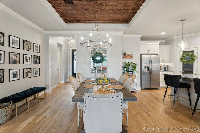 dining room featuring an inviting chandelier, a tray ceiling, and wooden ceiling