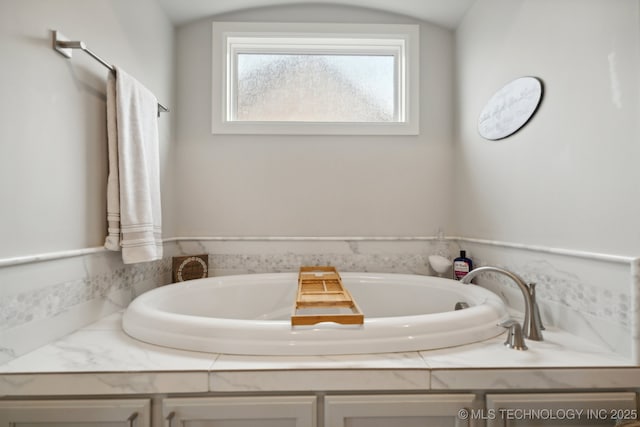 bathroom with a bath