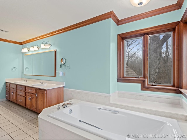 full bath with visible vents, crown molding, a garden tub, and a sink