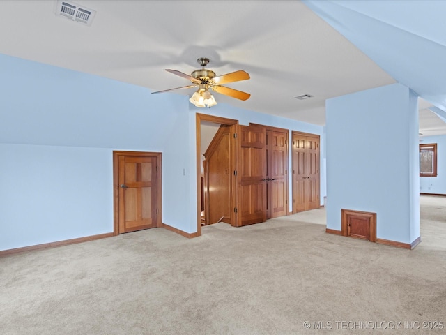 bonus room with visible vents, baseboards, and carpet floors