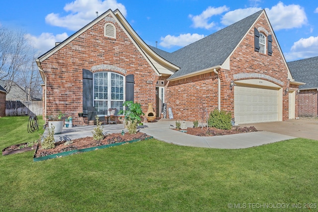 view of front of home featuring a front yard, a shingled roof, concrete driveway, a garage, and brick siding