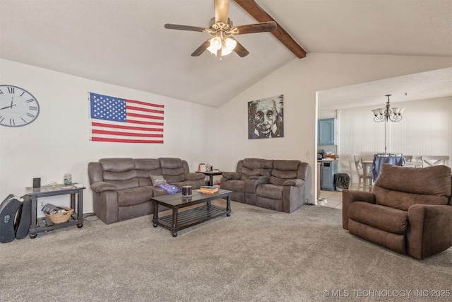 carpeted living area featuring ceiling fan with notable chandelier and lofted ceiling with beams