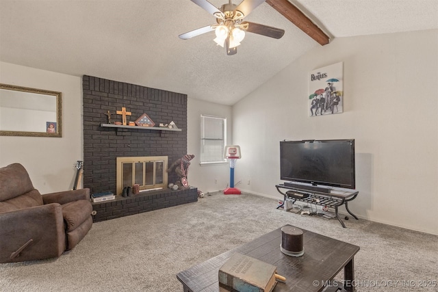 living area with a ceiling fan, a textured ceiling, carpet flooring, a brick fireplace, and vaulted ceiling with beams