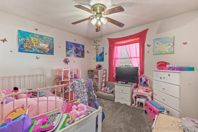 carpeted bedroom with a textured ceiling and a ceiling fan