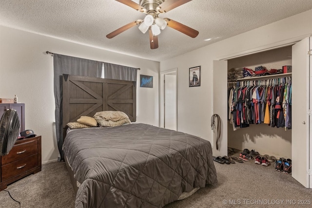 bedroom featuring a closet, a textured ceiling, and carpet