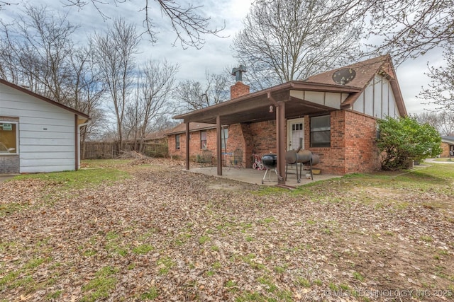 view of yard with a patio and fence