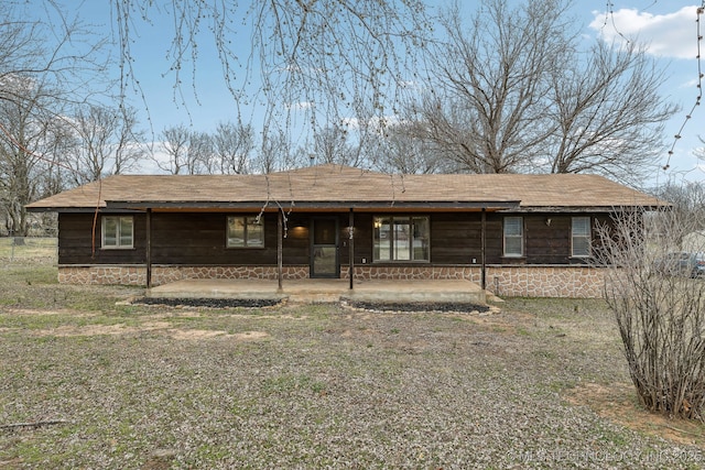 view of front of home with a patio area