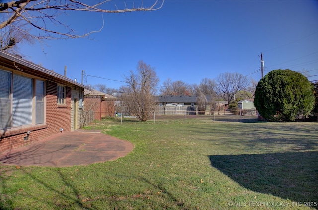 view of yard with a patio and a fenced backyard