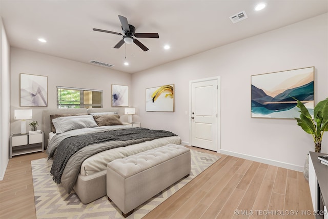 bedroom with visible vents, recessed lighting, and light wood-style floors