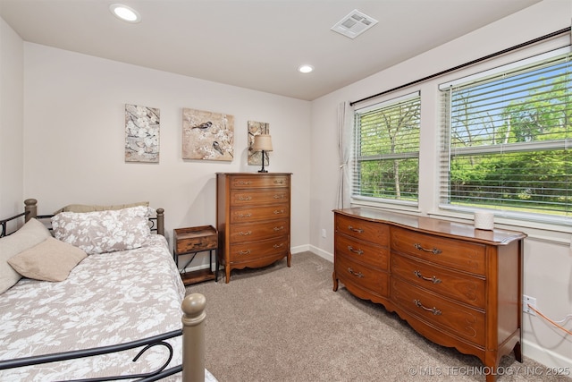 bedroom featuring light carpet, baseboards, visible vents, and recessed lighting
