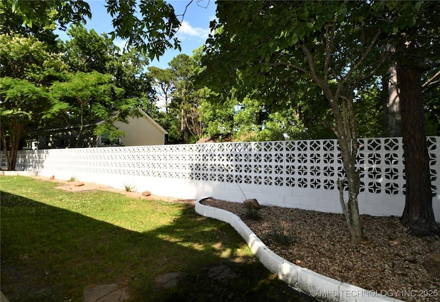 view of yard featuring fence