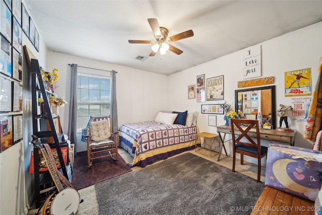 bedroom featuring visible vents