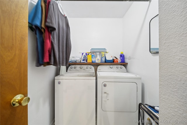 clothes washing area featuring laundry area and independent washer and dryer