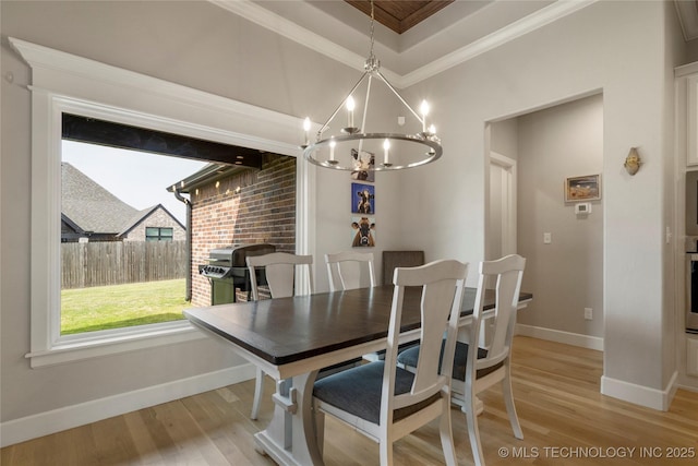 2910 E Olympia St, Broken Arrow, OK 74014 - dining room with light wood-type flooring, baseboards, ornamental molding, and a chandelier