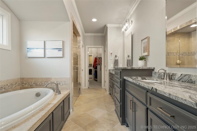 2910 E Olympia St, Broken Arrow, OK 74014 - full bathroom with a walk in closet, crown molding, a stall shower, a bath, and vanity