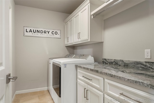 2910 E Olympia St, Broken Arrow, OK 74014 - laundry area featuring baseboards, cabinet space, and separate washer and dryer