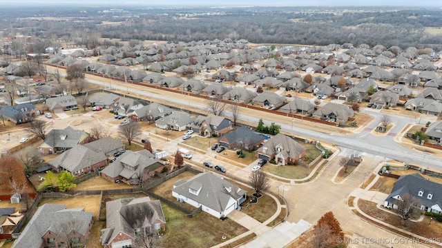 birds eye view of property with a residential view