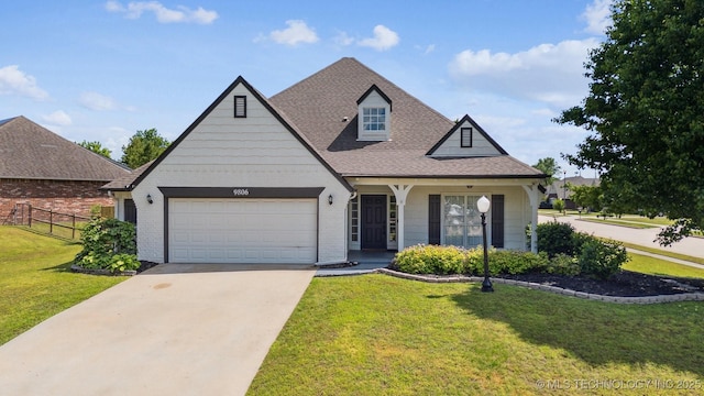 view of front of home featuring an attached garage, concrete driveway, and roof with shingles