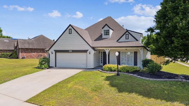 traditional home with a garage, a front lawn, concrete driveway, roof with shingles, and brick siding