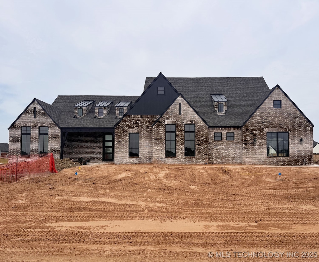 16412 S 1st E Ct, Glenpool, OK 74033 - view of front facade with brick siding and roof with shingles