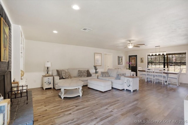 341 S Diamondhead Dr, Burneyville, OK 73430 - living room with a ceiling fan, recessed lighting, wood finished floors, and visible vents