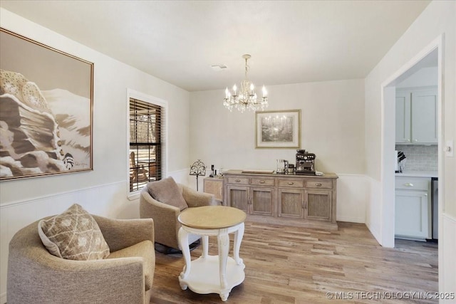 341 S Diamondhead Dr, Burneyville, OK 73430 - living area with a chandelier, visible vents, and light wood-style flooring
