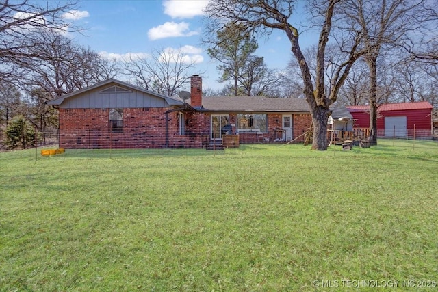 341 S Diamondhead Dr, Burneyville, OK 73430 - rear view of property with a lawn, brick siding, and a chimney