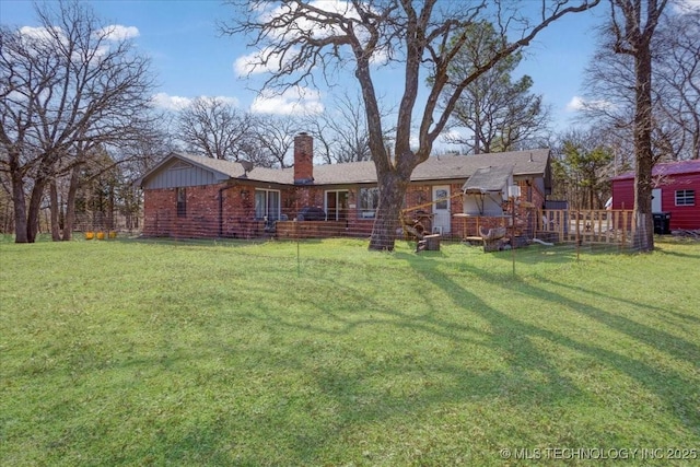 341 S Diamondhead Dr, Burneyville, OK 73430 - rear view of property featuring a lawn, brick siding, and a chimney