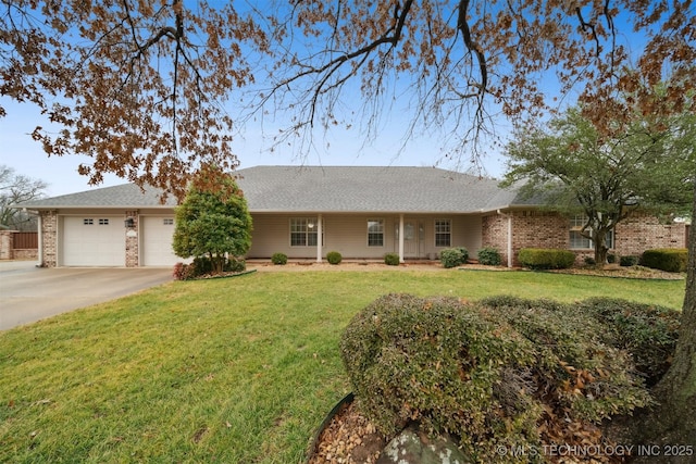 ranch-style house featuring roof with shingles, concrete driveway, a front yard, an attached garage, and brick siding