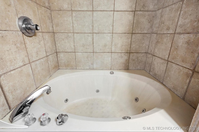 bathroom featuring a jetted tub