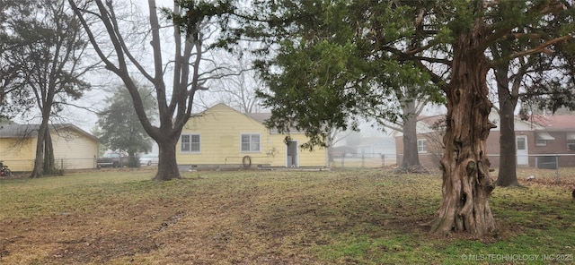 view of yard featuring fence
