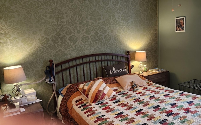 bedroom with wallpapered walls