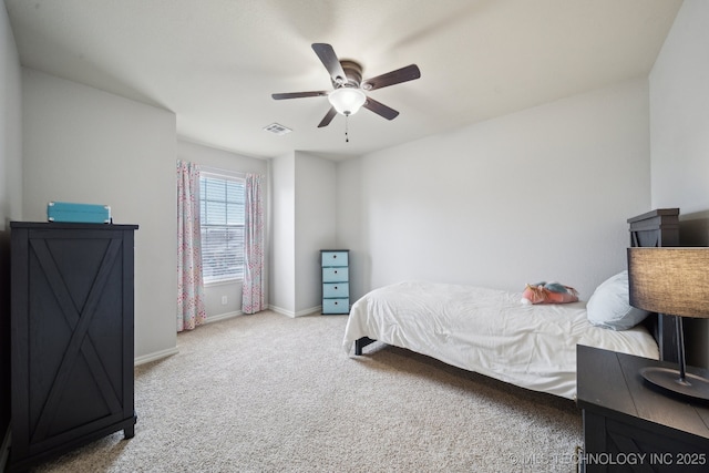 bedroom with a ceiling fan, carpet, visible vents, and baseboards