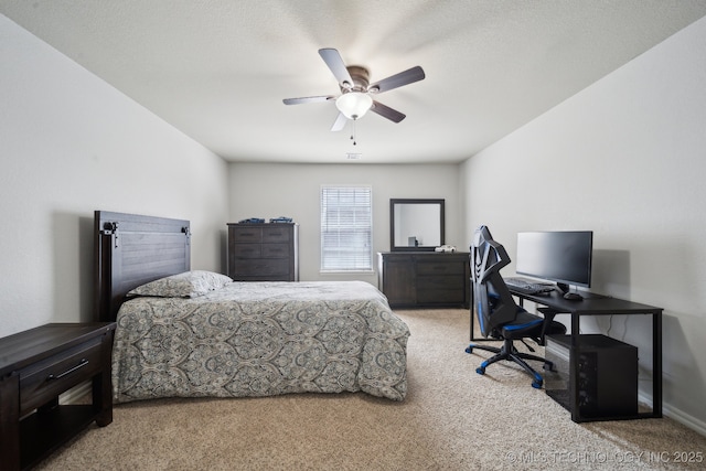 bedroom featuring baseboards, carpet floors, and ceiling fan