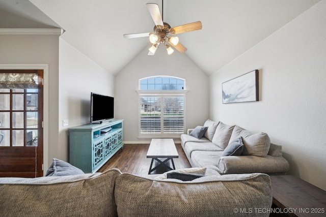 living room featuring vaulted ceiling, a ceiling fan, and dark wood-style flooring