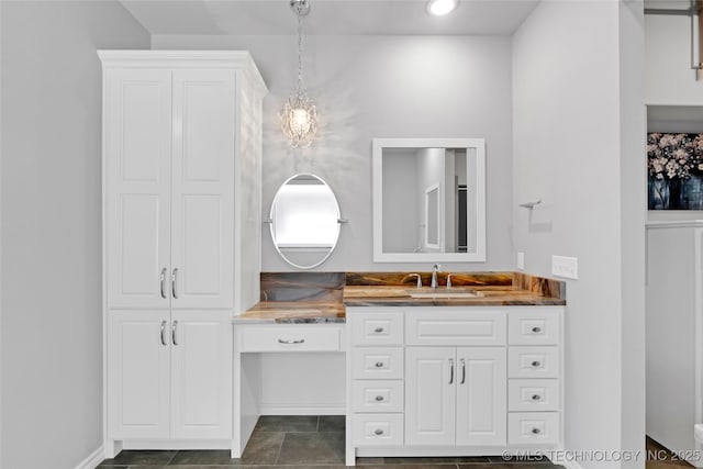 bathroom with recessed lighting and vanity