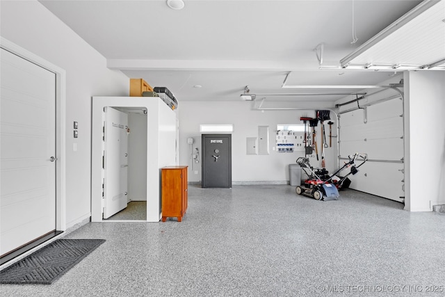 garage featuring electric panel and a garage door opener