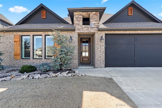 view of front of home featuring brick siding, concrete driveway, roof with shingles, a garage, and stone siding