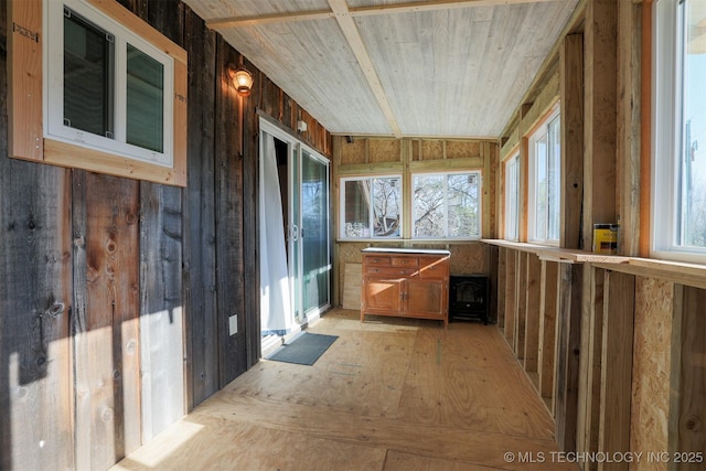 unfurnished sunroom featuring wooden ceiling