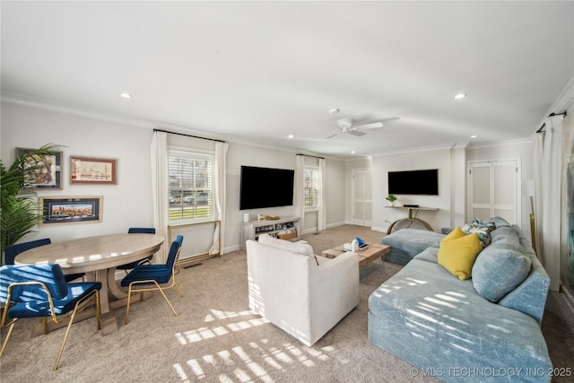 living room with a ceiling fan, carpet, baseboards, recessed lighting, and crown molding