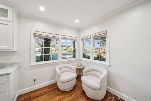 sitting room with recessed lighting, ornamental molding, baseboards, and wood finished floors