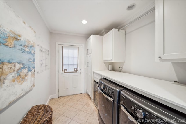 laundry area with light tile patterned floors, cabinet space, recessed lighting, crown molding, and washing machine and dryer