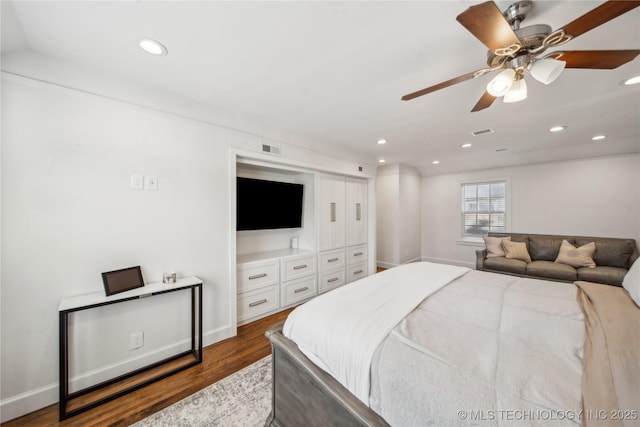 bedroom featuring dark wood finished floors, recessed lighting, visible vents, and a ceiling fan