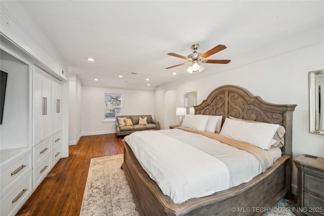 bedroom featuring visible vents, baseboards, ceiling fan, dark wood finished floors, and recessed lighting