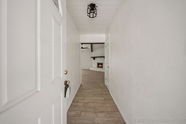 hall with wood finished floors