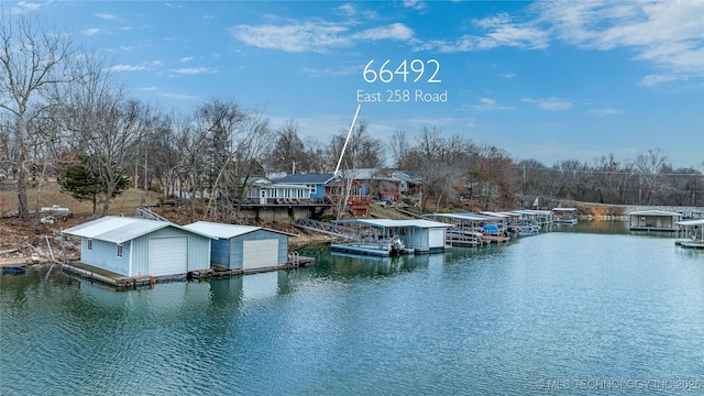 water view featuring a floating dock